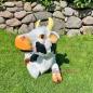 Preview: Kuh liegend im Garten als Deko idee