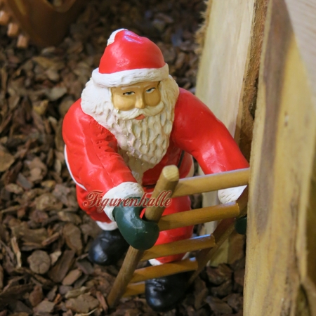 Weihnachtsmann auf Leiter