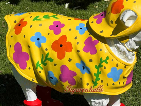 Preview: Schäfchen mit Regenmantel Blumen Muster