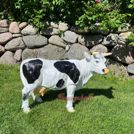 Black and Colorful Cow Figurines