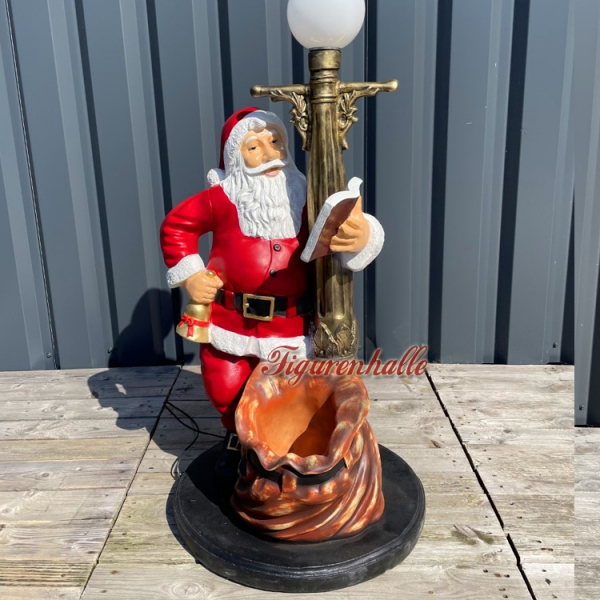 Weihnachtsmann an Laterne Figur