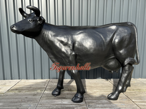 Cow statue garden figure with spots