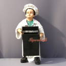 Bäckerjunge mit Brotkorb als Werbeaufsteller