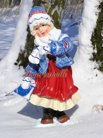 Christmas figure in winter clothes