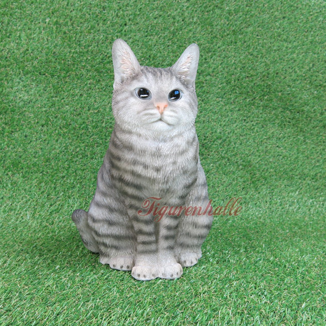 Cat Moritz figure sitting gray