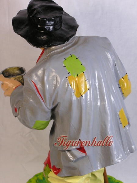 Hobo figure with patchwork shirt