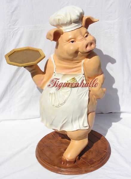 Pink pig as cook