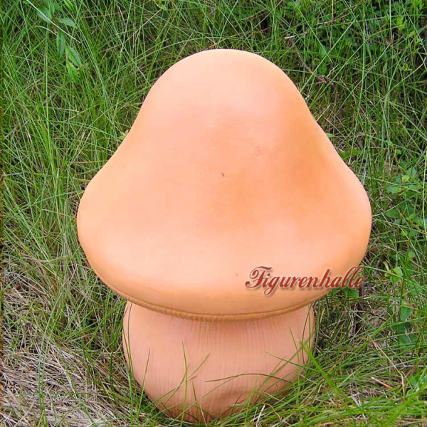 Pilz mit Gesicht als Gartenfigur